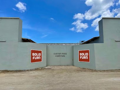 ingang werkplaats workshop solidfurn aruba